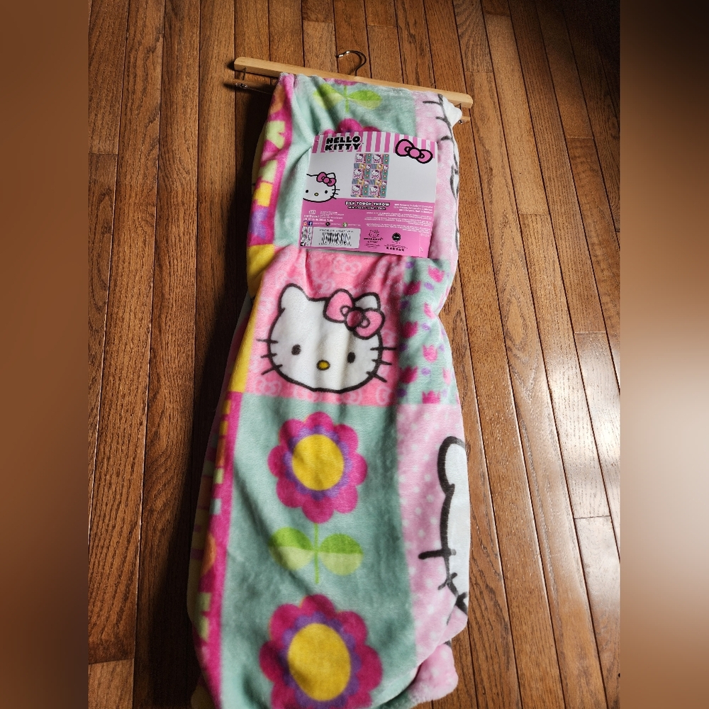 Northwest Hello Kitty Pink and Green Blanket